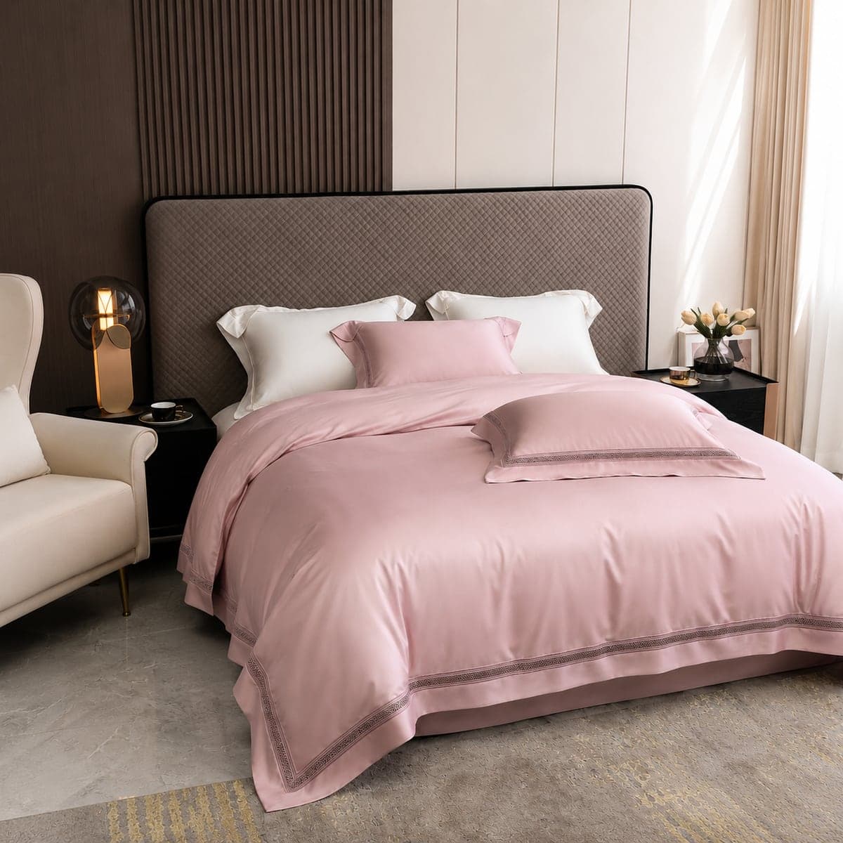 The Blush Pink bedding set on a king bed, three-quarter view